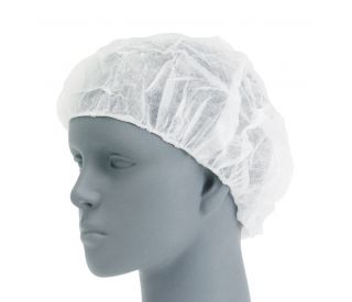 UltraCruz&reg; Spunbonded Polypropylene Bouffant Cap, 100/bag: Bouffant cap shown in use, offering a secure fit and full cover 